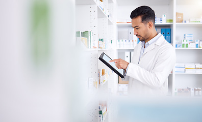 Image showing Pharmacist, medicine and Asian man with tablet to check inventory, stock or healthcare for online prescription. Pharmacy, medical worker or employee with pills, health products or internet connection