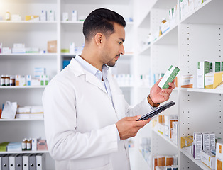 Image showing Man, pharmacist and tablet for pills, stock check and reading in pharmacy store. Technology, inventory medicine and medical doctor with pharmaceutical drugs, medication or supplements for healthcare.