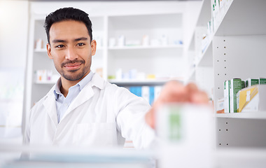 Image showing Asian man, pharmacist and medicine for stock check at pharmacy, drugstore or shelf. Medical professional, inventory pills or doctor with pharmaceutical drugs, medication or supplements for healthcare