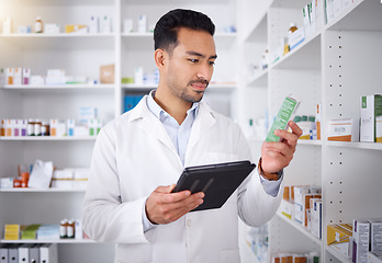 Image showing Man, pharmacist and tablet for medicine, stock check and reading in pharmacy store. Technology, inventory pills and medical doctor with pharmaceutical drugs, medication or supplements for healthcare.