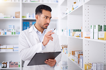 Image showing Pharmacist, medicine and man with checklist for stock in pharmacy store. Pills, inventory and medical doctor with clipboard to count pharmaceutical drugs, supplements and medication for healthcare.