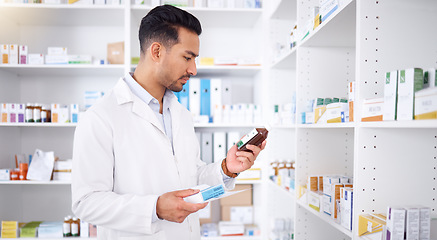 Image showing Pharmacist, medicine and man with bottle to check stock in pharmacy store. Medication, inventory and medical doctor reading label on pharmaceutical drugs, supplements and information for healthcare.