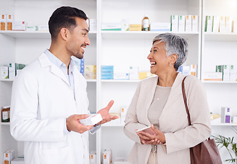 Image showing Pharmacist man, senior woman and talking with box, phone or funny in store for prescription, health or help. Young pharmacy manager, elderly patient and comic chat for care with customer experience