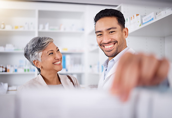 Image showing Happy, senior woman and pharmacist to help, customer service or offer advice on a product, medicine or prescription. Trust, pharmacy and man helping elderly female with shopping, information or pills