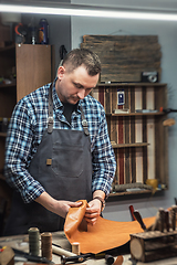 Image showing Concept of handmade craft production of leather goods.