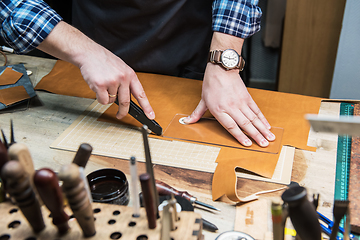 Image showing Concept of handmade craft production of leather goods.