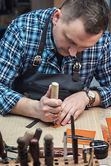 Image showing Concept of handmade craft production of leather goods.