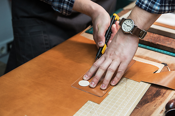 Image showing Concept of handmade craft production of leather goods.