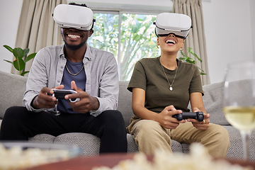 Image showing Virtual reality, happy couple and gaming on sofa in home living room, bonding together or having fun. Vr, couch and African man and woman play 3d game, metaverse or esports with futuristic technology