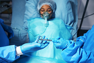 Image showing Hands, scissors and surgery with a team of doctors operating on a patient in the hospital emergency room. Medical, equipment or operation with medicine professionals in a clinic theatre from above