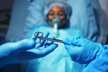 Image showing Hands, scissors for operation and a surgeon team with a patient in the hospital emergency room. Medical, equipment or surgery with doctors or medicine professionals in a clinic theatre from above