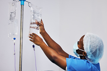 Image showing Hospital, nurse with face mask and black woman with iv drip medicine, fluid infusion or liquid injection bag. Nursing, doctor or surgeon monitoring intravenous medication, .anesthesia or healthcare