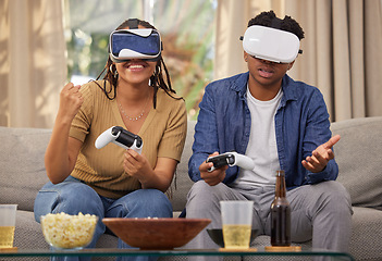 Image showing Man, woman and virtual reality video game and challenge, competition winner and futuristic gaming date at home. Metaverse, fist pump and digital world, couple in living room with 3D games and tech