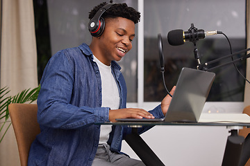 Image showing Black man with a podcast, laptop and microphone with headphones for audio, technology or listening to sound in office. Talking, radio and presenter of live streaming show, broadcast or discussion