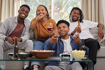 Image showing Television, relax and friends on a sofa with beer and popcorn for movie, film or streaming in their home. Group of people, watching tv and smile in living room together with entertainment on weekend