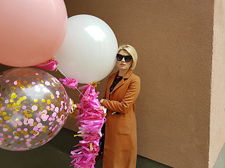 Image showing Young fashion happy blonde woman with baloons ,fashion photo, instagram filter