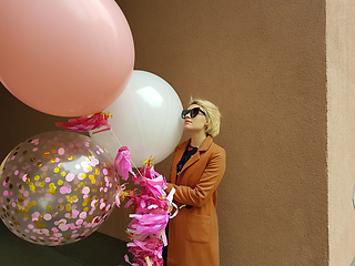 Image showing Young fashion happy blonde woman with baloons ,fashion photo, instagram filter