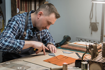 Image showing Concept of handmade craft production of leather goods.