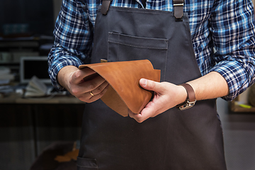 Image showing Concept of handmade craft production of leather goods.