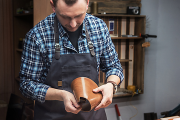 Image showing Concept of handmade craft production of leather goods.