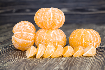Image showing peeled orange juicy tangerine