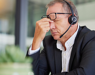 Image showing Call center, headache and business man stress, health problem or fatigue for communication or finance fail. Agent, consultant or sales person with eye pain, tired and online or financial mistake