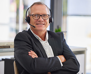 Image showing Call center, mature man and arms crossed in portrait for communication, customer service or contact us for faq CRM questions. Happy salesman, microphone and smile for telemarketing support in office