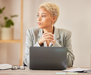 Image showing Thinking, serious and a woman with a laptop in an office for ideas, inspiration and business vision. Focus, desk and a corporate employee with plan for an email, web research or work on a computer