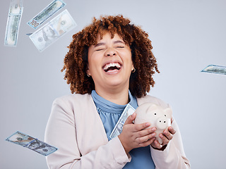 Image showing Happy woman with money rain, piggy bank and savings in studio, finance and budget with dollar investment. Happiness, growth and cash profit, salary bonus for girl with money box on white background.