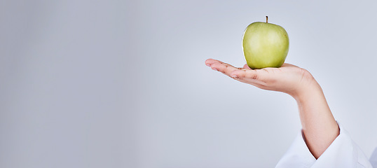 Image showing Mockup apple, hand and banner for diet marketing, health promotion or advertising nutrition. Space, wellness and person with a fruit or food for detox or vegan balance isolated on a white background