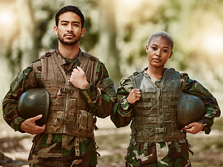 Image showing Soldier, military and portrait of man and woman in gear in nature for service, protection and training outdoors. Camouflage, national army and people for battle, operation or combat exercise in woods