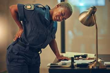 Image showing Police, woman and back pain in a cop station with spine problem and injury from career. Female person, security guard and inflammation with backache from arrest accident at high risk job with stress