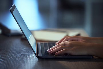 Image showing Woman, hands and laptop at night typing email for communication, social media or browsing. Closeup of female person or journalist working late on computer for online chat, networking or copywriting