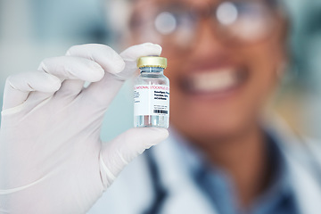 Image showing Healthcare, hands and vaccine and medicine bottle with doctor in blurry background. Innovation, vaccination and medical professional with container for treatment for prevention or cure for smallpox.