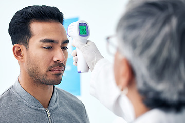 Image showing Fever, thermometer and a doctor with a patient in the hospital for a healthcare checkup or temperature reading. Medical, consulting or trust and a sick man in a clinic with a medicine professional