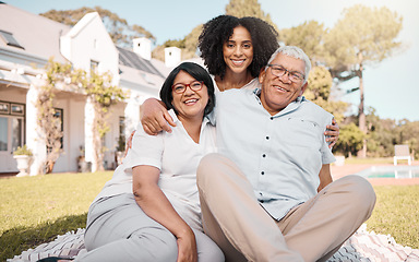 Image showing Portrait, family and hug in a garden for love, care or bonding together on the weekend. Smile, happy and a woman with senior mother and father relax with daughter in home backyard in summer on grass