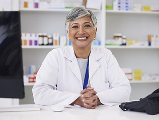 Image showing Portrait, pharmacist and smile with professional for happiness at chemist for medicine or help. Mature female, pharmacy and face with smile for medicine with customer service in retail healthcare.