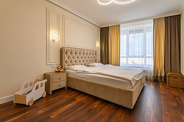 Image showing Beige modern bedroom interior with double bed