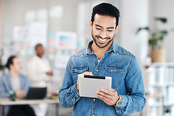 Image showing Tablet, digital and businessman typing online and happy for startup financial growth on a website, web or internet. Smile, technology and entrepreneur planning and working on a company proposal