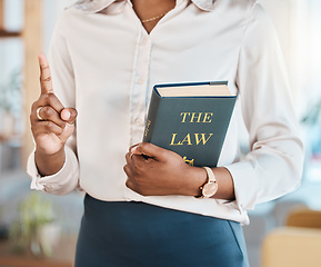 Image showing Legal, lawyer and book with hands of black woman in office for advocate, justice and consultant. Attorney, advisor and study with closeup of person in law firm for knowledge, expert and government