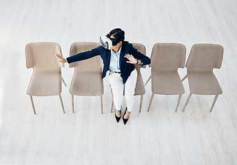 Image showing Business woman, vr headset and sitting cyber game with professional in office with innovation work. Virtual reality glasses, female employee and above view with ai, 3d and future platform at job