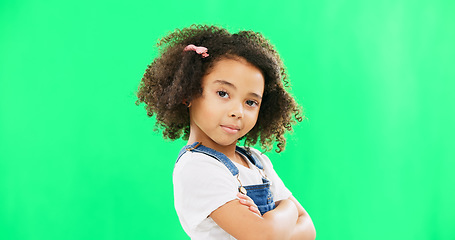 Image showing Face, eyebrows and child on green screen with attitude, arms crossed and confident on mockup background. Portrait, confident and girl with emoji, smirk and expression, looking and posing in studio