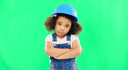 Image showing No, green screen and portrait of child shaking head arms crossed feeling sad isolated in studio background. Helmet, safety and annoyed young kid is frustrated, upset and refuse gesture