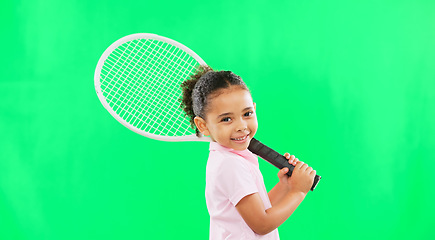 Image showing Child, athlete and kid tennis player ready for training, exercise and workout isolated in studio green screen background. Portrait, girl and cute young person or beginner in fitness or sport