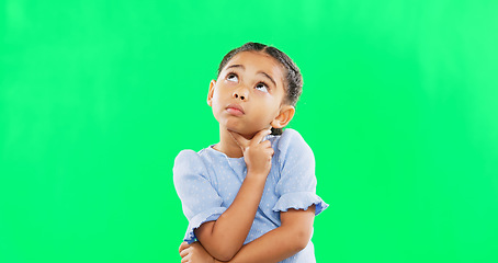 Image showing Green screen, thinking and confused child in studio with decision, contemplation and pensive on mockup background. Doubt, emoji and unsure girl contemplating choice, why or solution while isolated