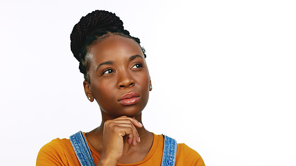 Image showing Thinking, doubt and portrait of a black woman with an idea isolated on a white background in studio. Think, planning and African girl with a solution, thoughtful and contemplation on a backdrop