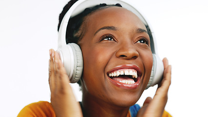 Image showing Happy, black woman and headphones for streaming music, excited and celebration against a studio background. African American female, lady and headset with happiness, audio and girl singing with song
