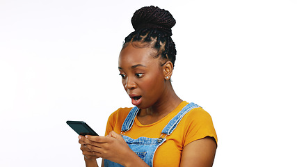 Image showing Smile, typing and happy black woman with phone on white background for funny meme, humor and comic text. Communication, social media and girl laugh on smartphone for news, surprise and shocked face