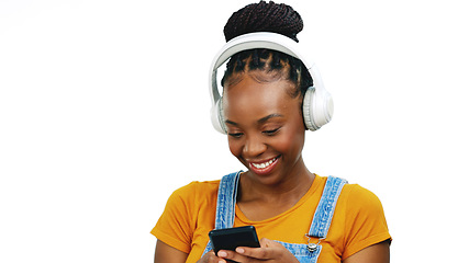 Image showing Black woman listening to music with headphones, smartphone and dancing isolated on white background. Happy female, radio streaming with fun and enjoy playlist with audio subscription and mockup