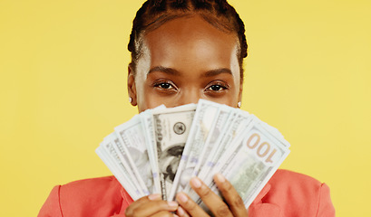 Image showing Portrait, happy black woman and money fan, dollar mockup, savings and profit for startup loan isolated on yellow background. Cash, budget and prize, success in financial freedom in studio with bonus.